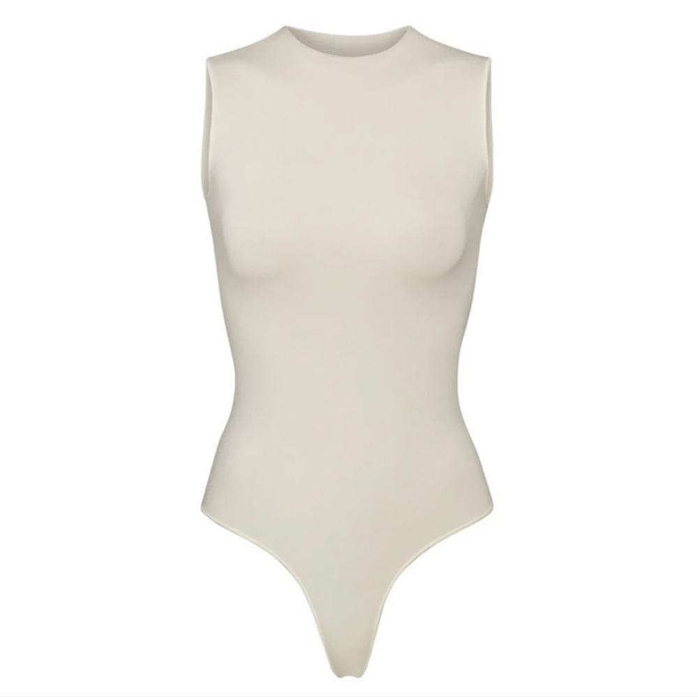 SKIMS Sleeveless Crewneck Bodysuit in Light Beige